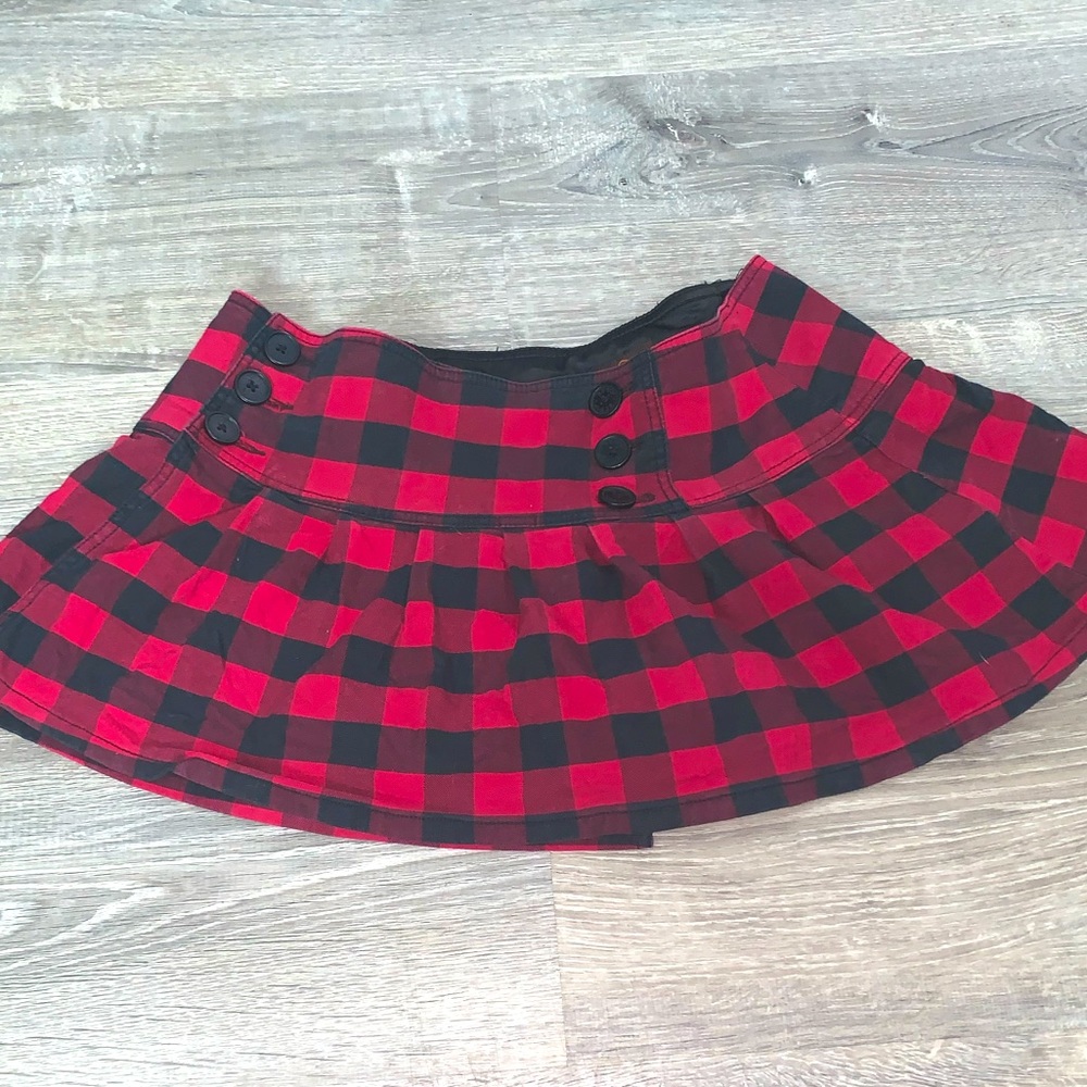 Size 11 BeBop plaid buttoned skirt.